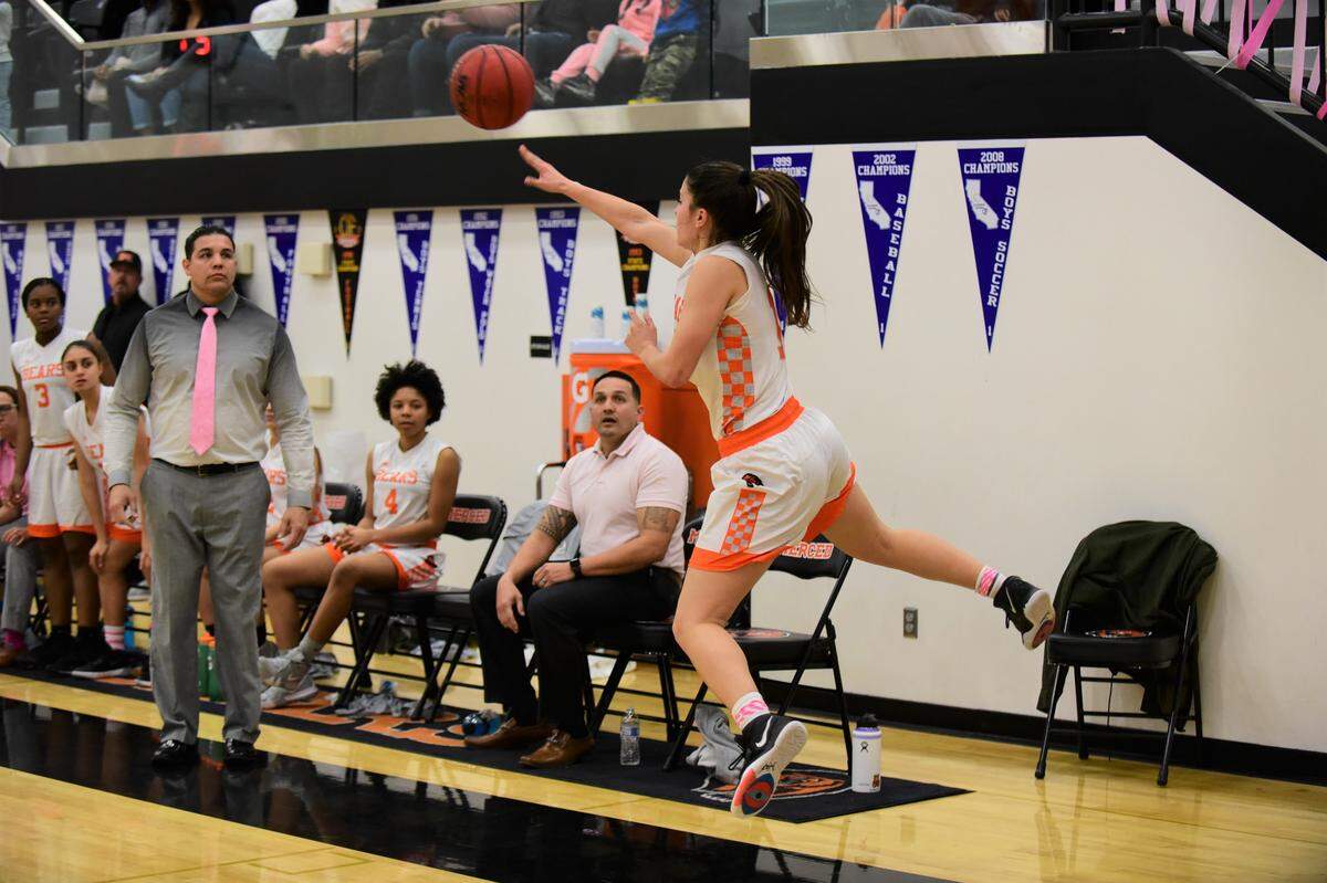 Merced High’s Kaitlynn Perez saves a ball from going out of bounds during a game against Atwater on Thursday, Feb. 6, 2020.