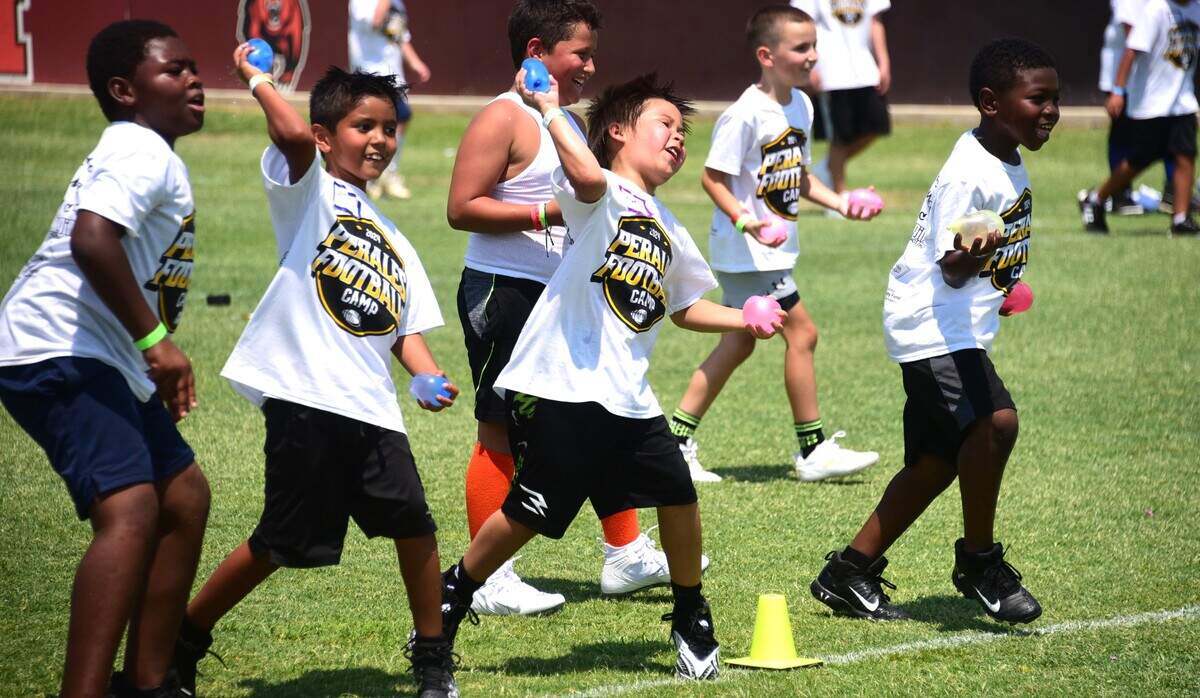 The kids ended the David Perales Football Camp with a water balloon fight on Saturday, July 13, 2024 at Merced High Schools.