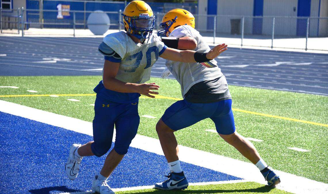 Dos Palos High School sophomore Justin Hurd (70) participates in defensive drills during practice on Tuesday, Aug. 13, 2024.