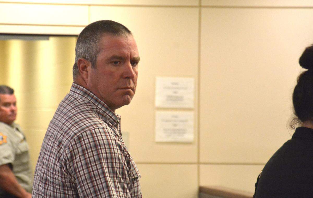 Former Atwater police officer Dennis Frank, 44, looks at Merced County Deputy District Attorney Katie Gates as she talks about his domestic violence battery charge during his sentencing hearing Thursday, June 20, 2019, in Merced Superior Court.