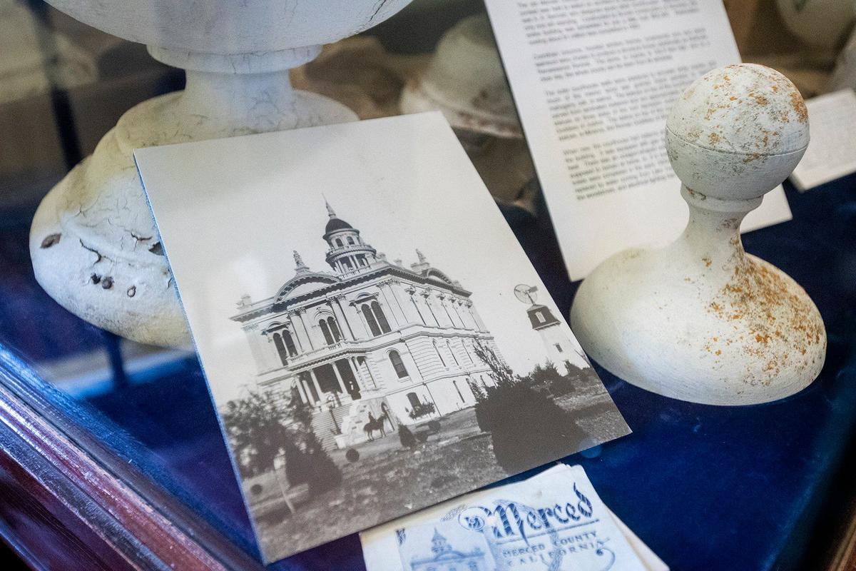A photo of the Merced County Courthouse on display at what is now the Merced County Courthouse Museum in Merced, Calif., on Thursday, Aug. 22, 2024. Built in 1875, the building served as a courthouse until 1950 and as a county administration building until 1970. The building opened as a history museum in 1983.