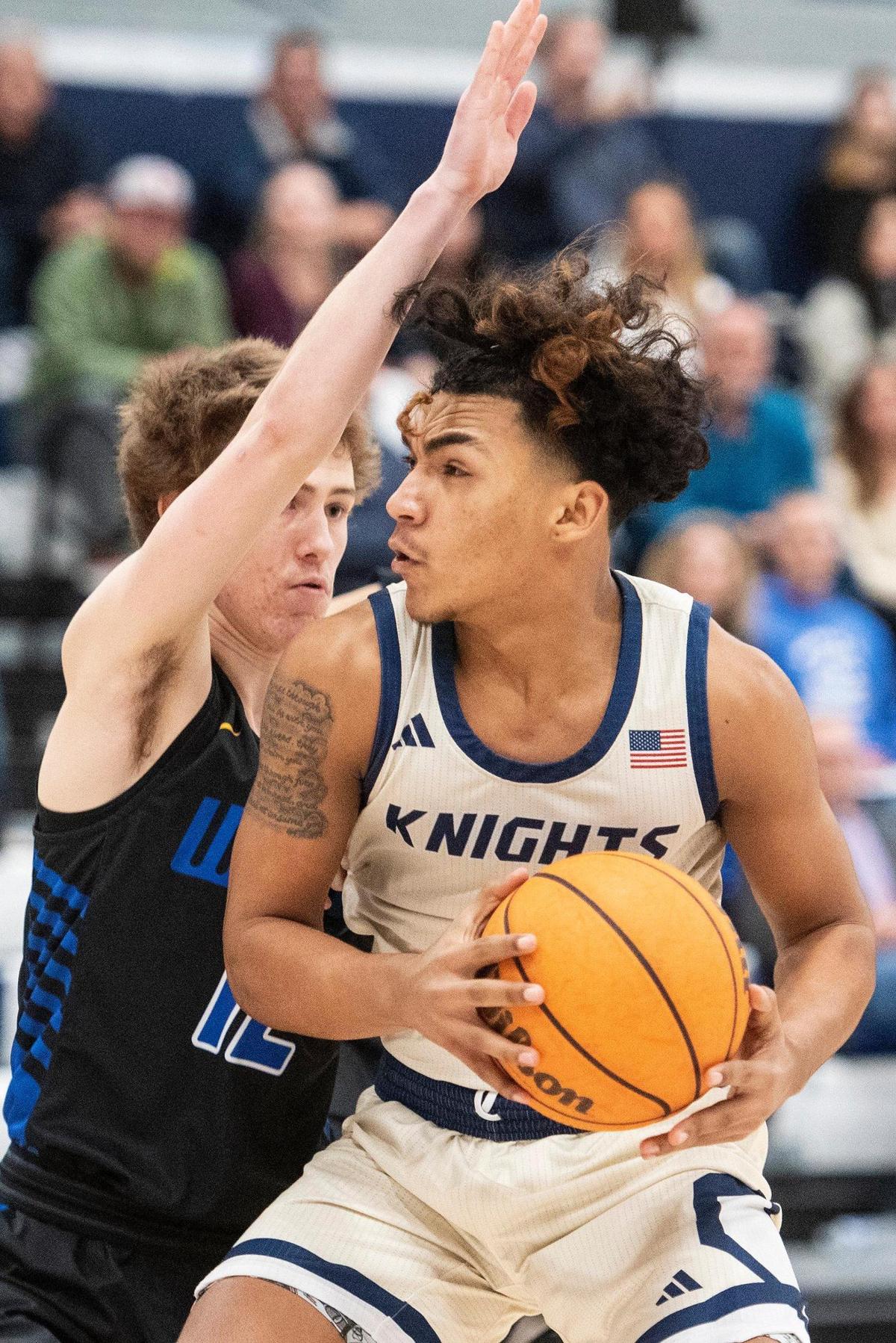 Stone Ridge Christian sophomore Daijon O’neil (2) drives to the basket during a CIF Sac-Joaquin Section Division 6 playoff game against Sacramento Waldorf at Stone Ridge Christian High School in Merced, Calif., on Tuesday, Feb. 20, 2024. The Knights beat the Wave 50-37.