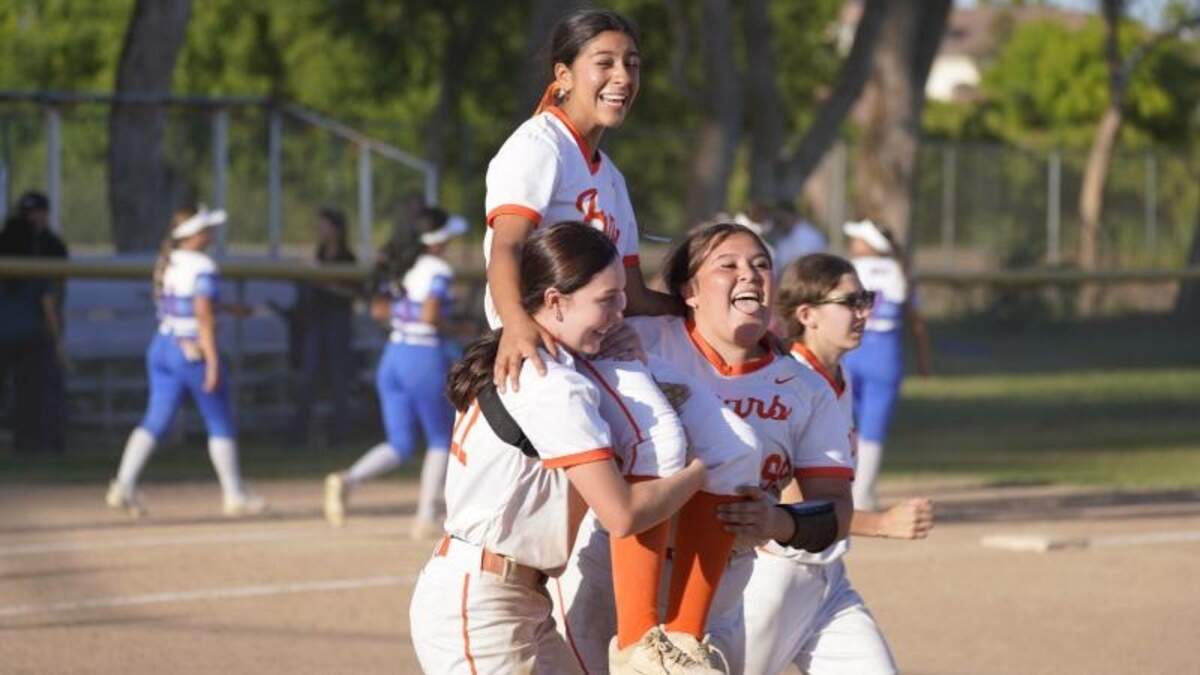 Merced High sophomore Emma Ramirez is carried off the field by her teammates after driving in the game-winning run on Thursday, April 30, 2026.