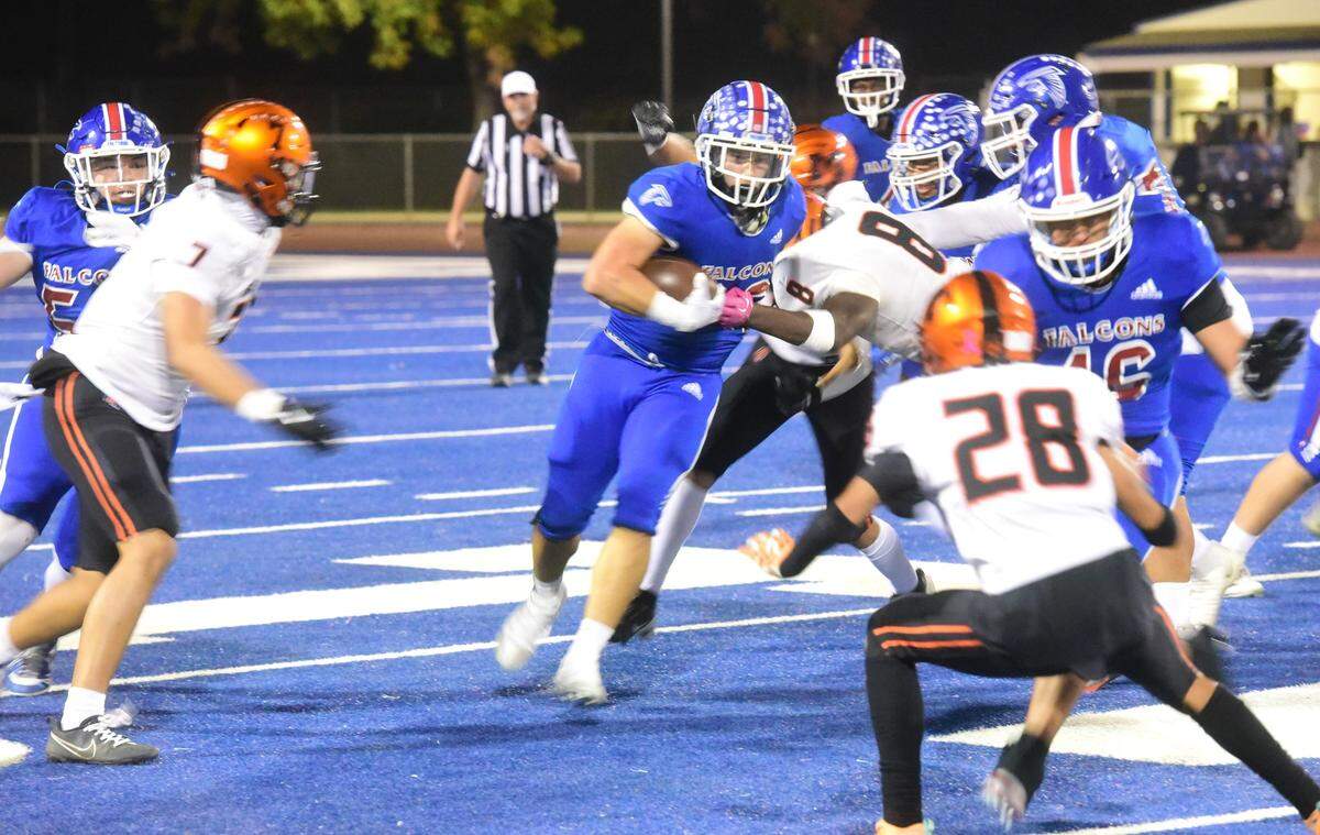 Atwater High running back Jeremiah De La Rosa (23) runs the ball during Santa Fe Bowl 44 against Merced on Friday, Oct. 26, 2024 at Dave Honey Stadium.