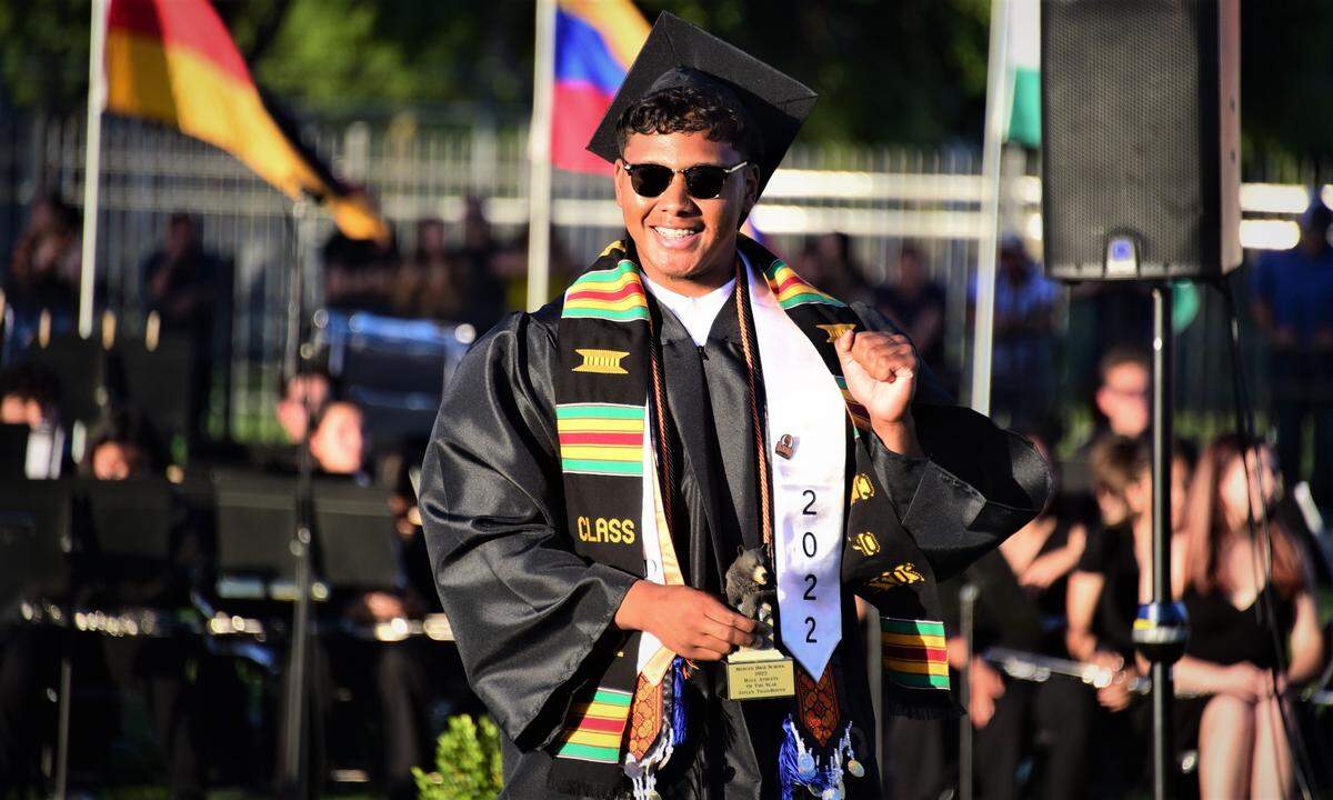 Merced High School senior Jaylen Thao-Booth receives the school’s Male Athlete of the Year award during the graduation ceremony held on Thursday, June 2, 2022.