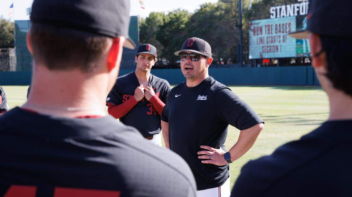 STANFORD, CA - Thomas Eager chats with players after a game between CSUN and Stanford Baseball at Sunken Diamond on March 6, 2022 in Stanford, California.