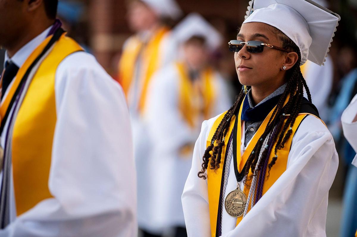 Graduates prepare to walk on stage during a commencement ceremony for the El Capitan High School class of 2022 on the El Capitan High School campus in Merced, Calif., on Thursday, June 2, 2022.