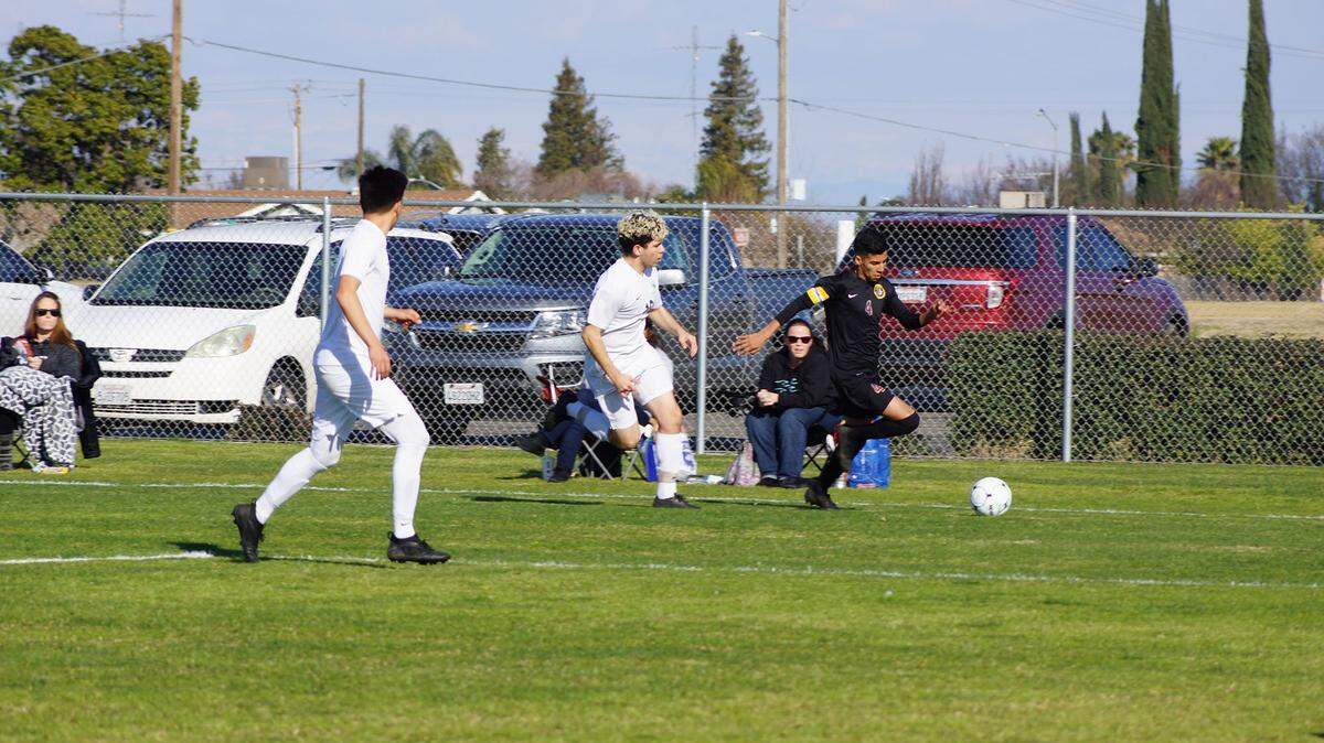 Livingston High senior Julian Cabrera advances the ball up field during the Wolves 2-0 win over Liberty Ranch in the Sac-Joaquin Section Division IV semifinals on Tuesday at Livingston High. Photo courtesy of Scott Winton.