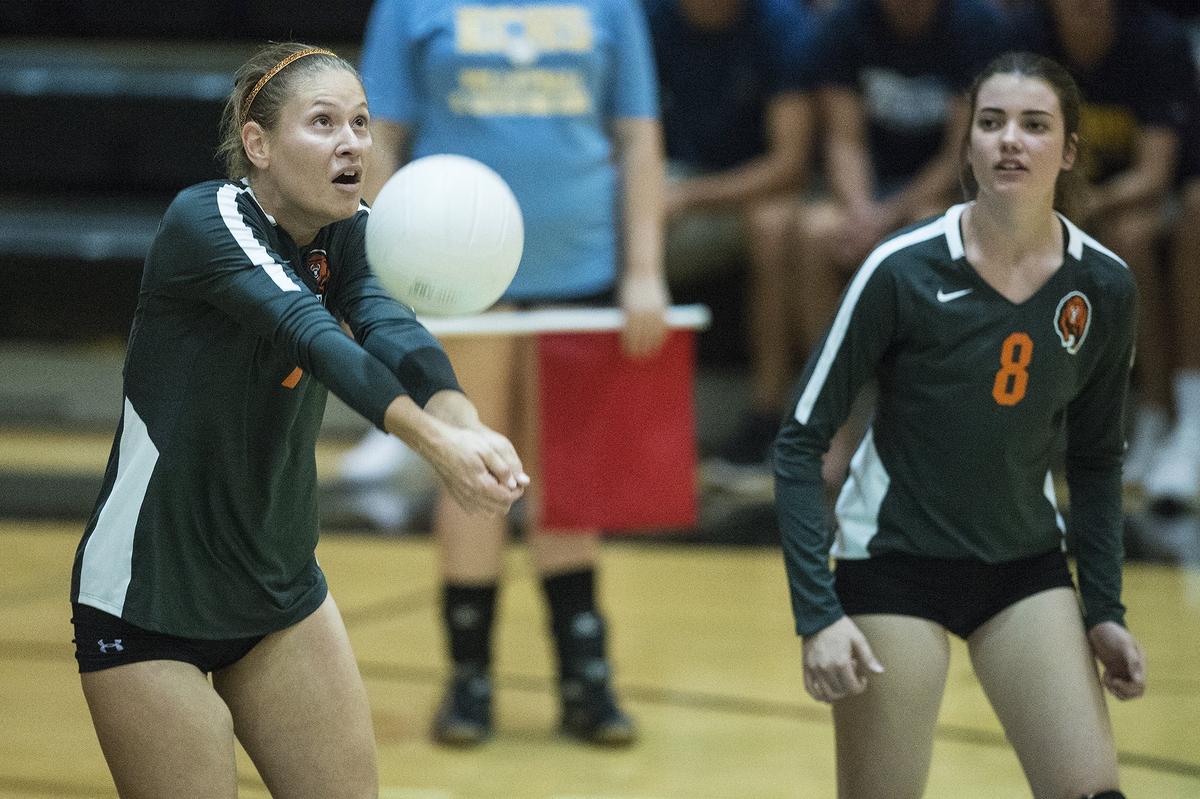 Merced senior Madi Kane (7) hits the ball during a match against El Capitan at El Capitan High School in Merced, Calif., on Wednesday, Sept. 12, 2018. The Gauchos beat the Bears 3-0.