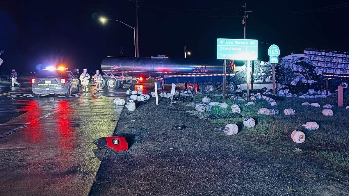 A big rig carrying propane containers crashed west of Merced on Monday night, leaving the small tanks strewed across the roadway.