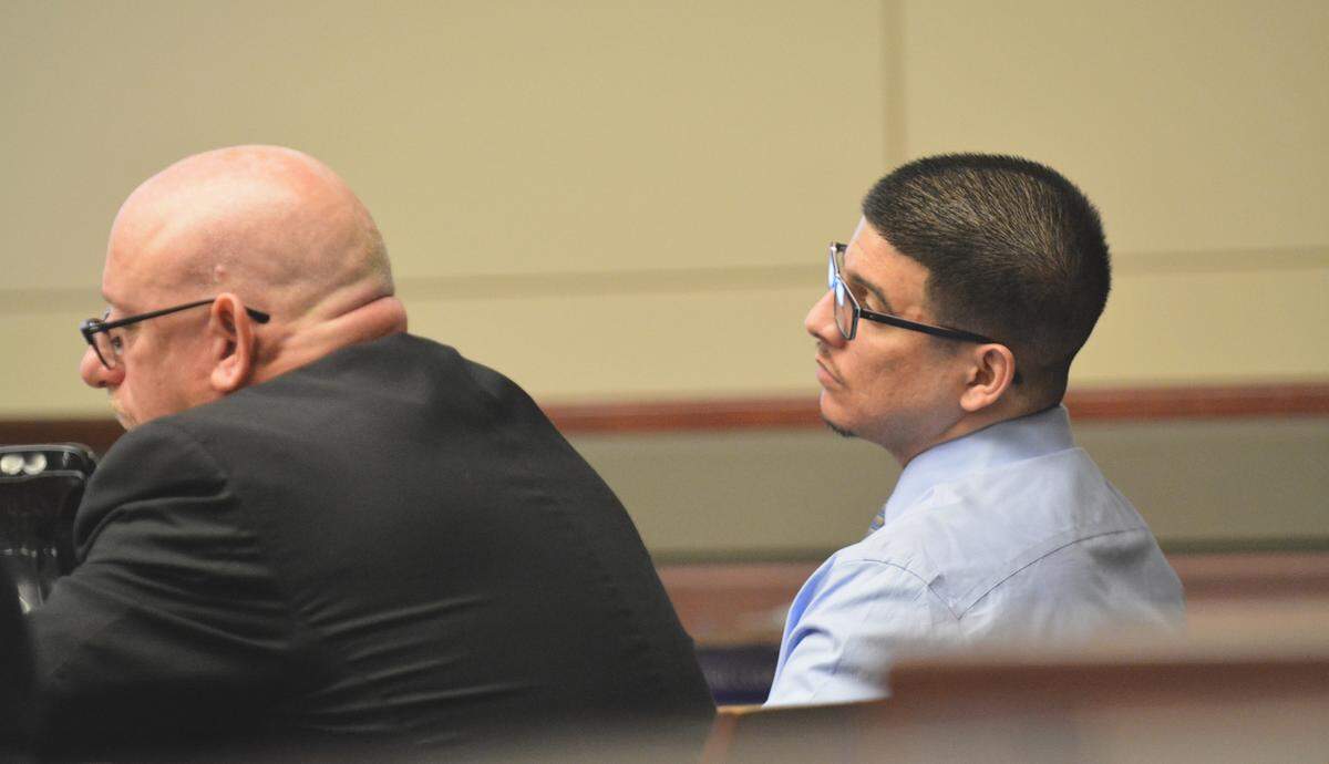 Michael Mirabal, right, and his conflict public defender Jonathan Richter listen lead prosecutor Katie Gates, a Merced County deputy district attorney, gives her closing statements to the jury in Mirabal’s murder trial on Friday, Aug. 23, 2019, in Merced Superior Court.