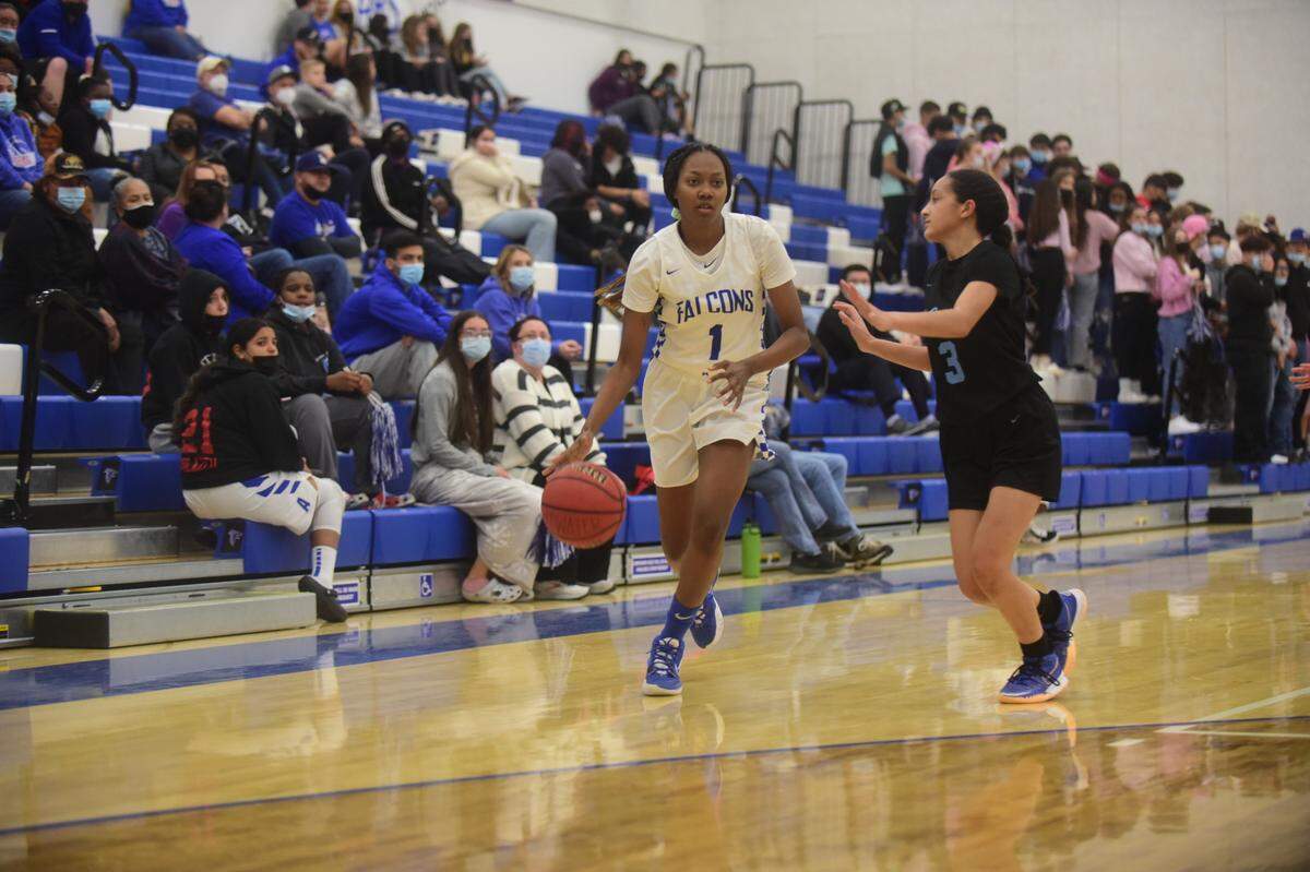 Atwater High senior Jordyn Allison dribbles the ball up the court during a game against El Capitan on Thursday, Feb. 3, 2022 at Atwater High School in Atwater, Calif.
