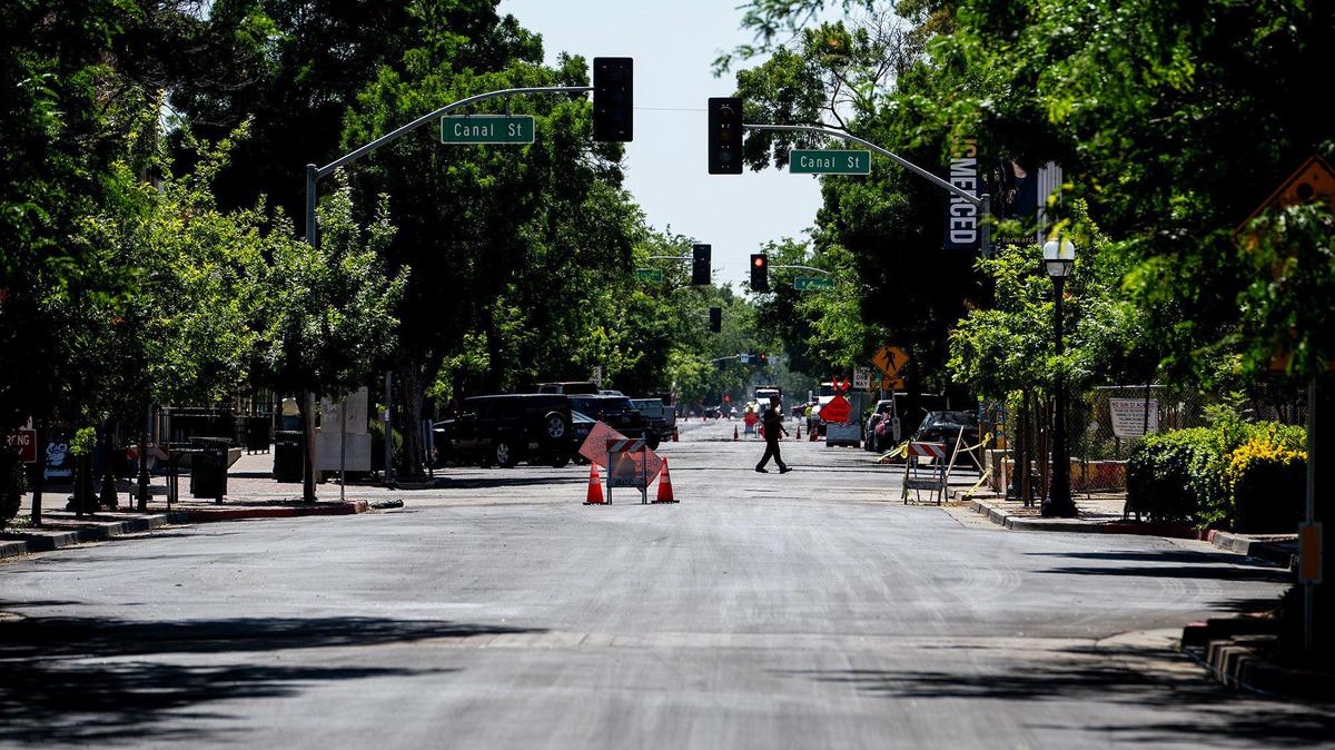 A section of West Main Street between M Street and Canal Street is closed as crews work to prepare streets for sealing, striping and one-way traffic in Merced, Calif., on Wednesday, May 28, 2025.