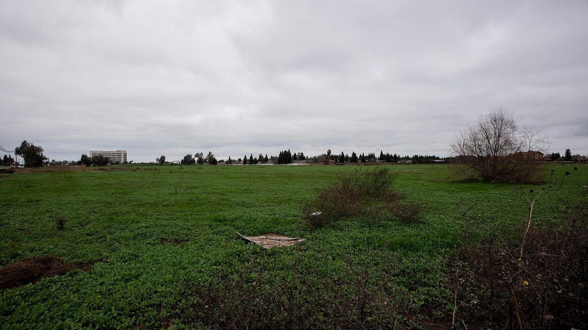 Empty land that scheduled for development including medical offices and a hotel near the intersection of Yosemite Avenue and G Street in Merced, Calif., on Wednesday, Jan. 22, 2020.