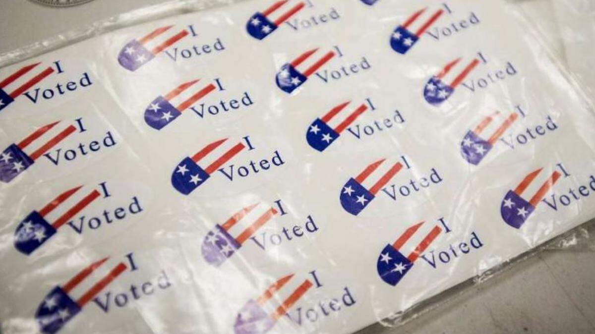 Election Day stickers are shown at the Merced County Registrar of Voters Office in 2018.