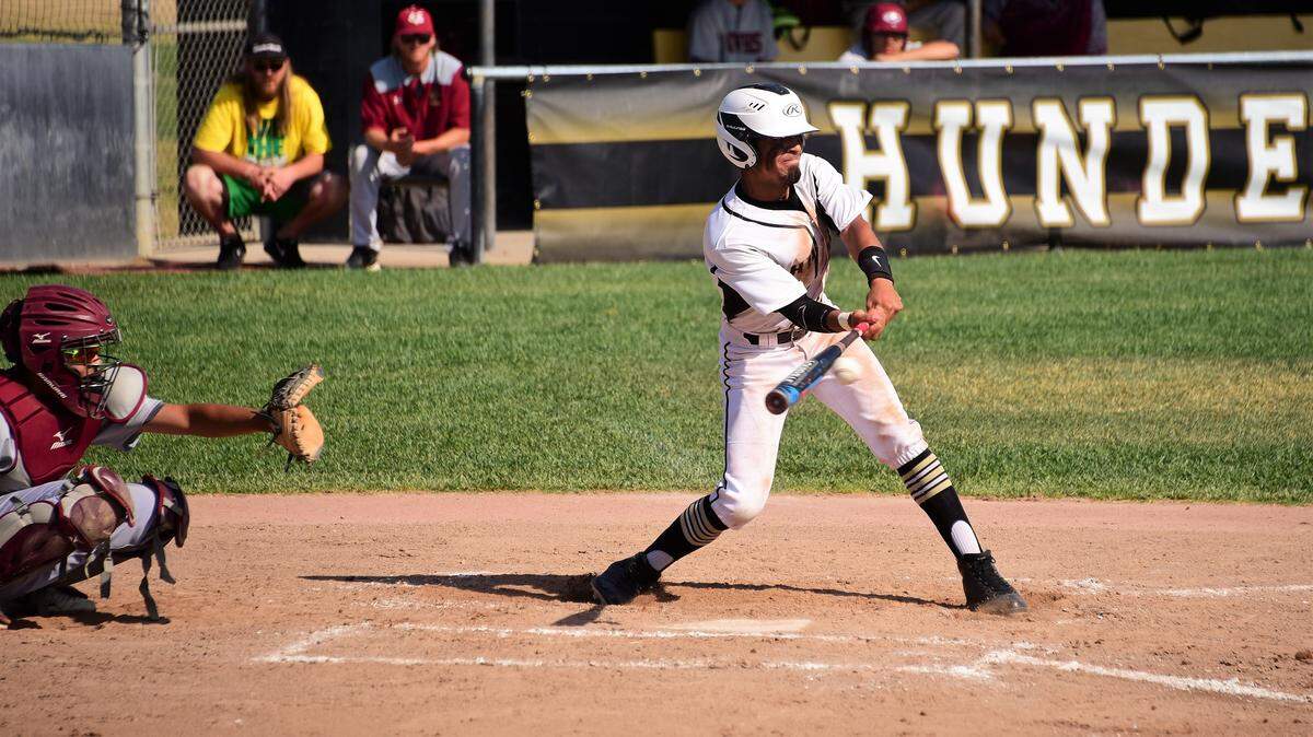 Buhach Colony senior Dhelahn Tilghman hits a double during the Thunder’s 13-5 win over Golden Valley. The Thunder clinched their second straight Central California Conference championship on Tuesday, May, 7, 2019.