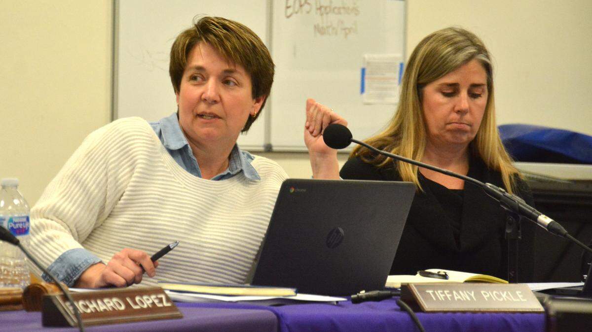 Newly elected board Vice President Tiffany Pickle (left) and Clerk Erin Hamm speak at the Jan. 9, 2019 Merced Union High School District school board meeting. Board members were discussing whether to suspend an initiative creating a school board member so the newly elected members can have their say.