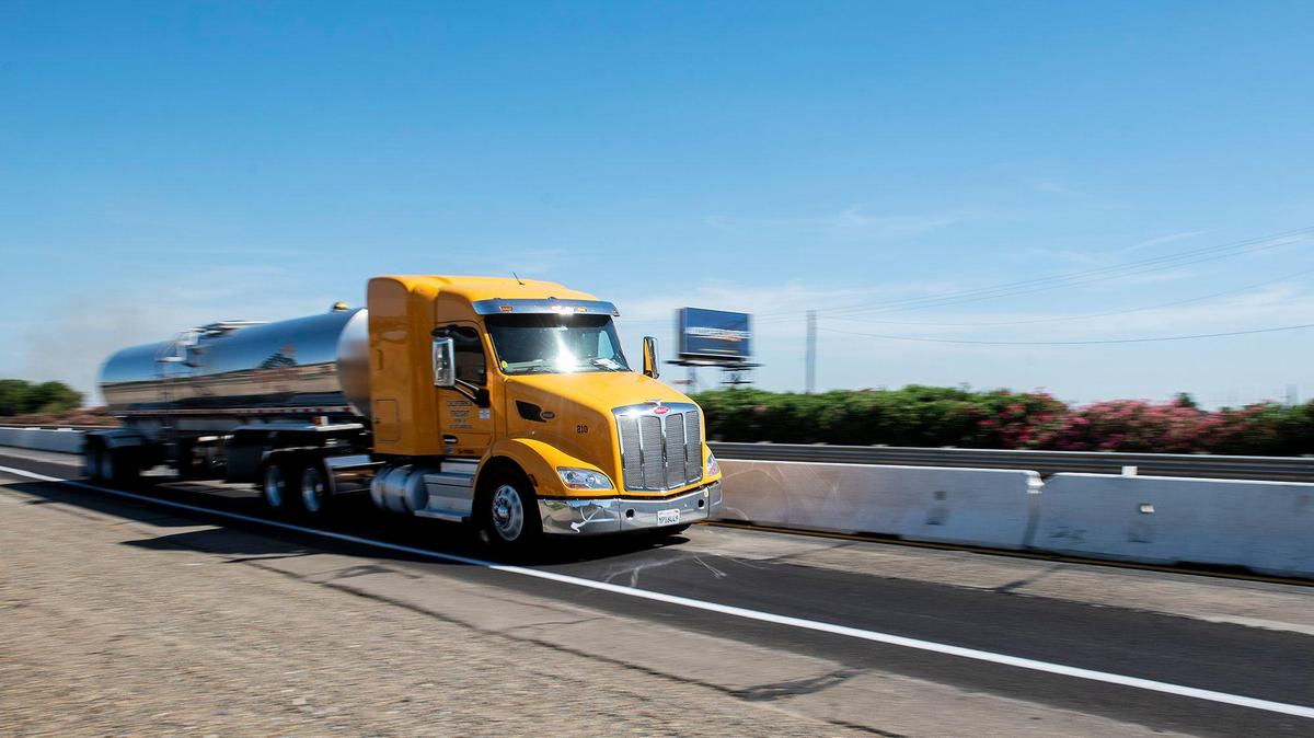 A truck drives north in the right lane of a split section of northbound Highway 99 under construction in Merced, Calif., on Wednesday, May 18, 2022.