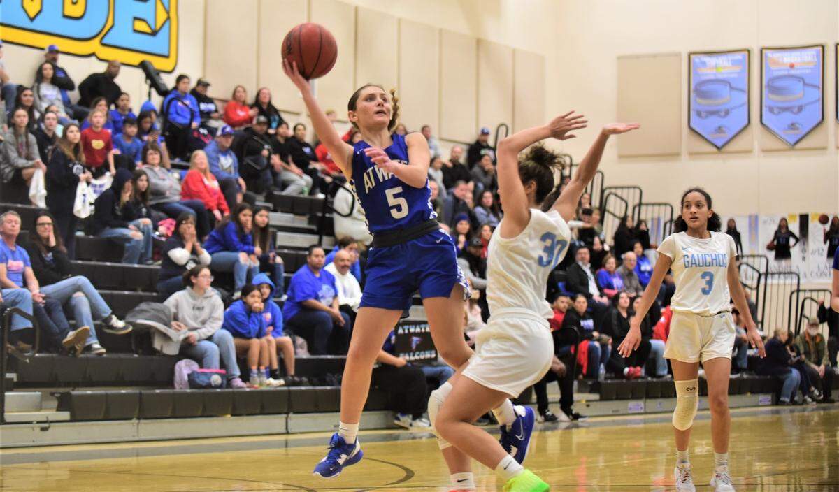 Atwater High sophomore Jolie Hart (5) goes up for a shot against El Capitan during a game on Thursday, Jan. 12, 2023.