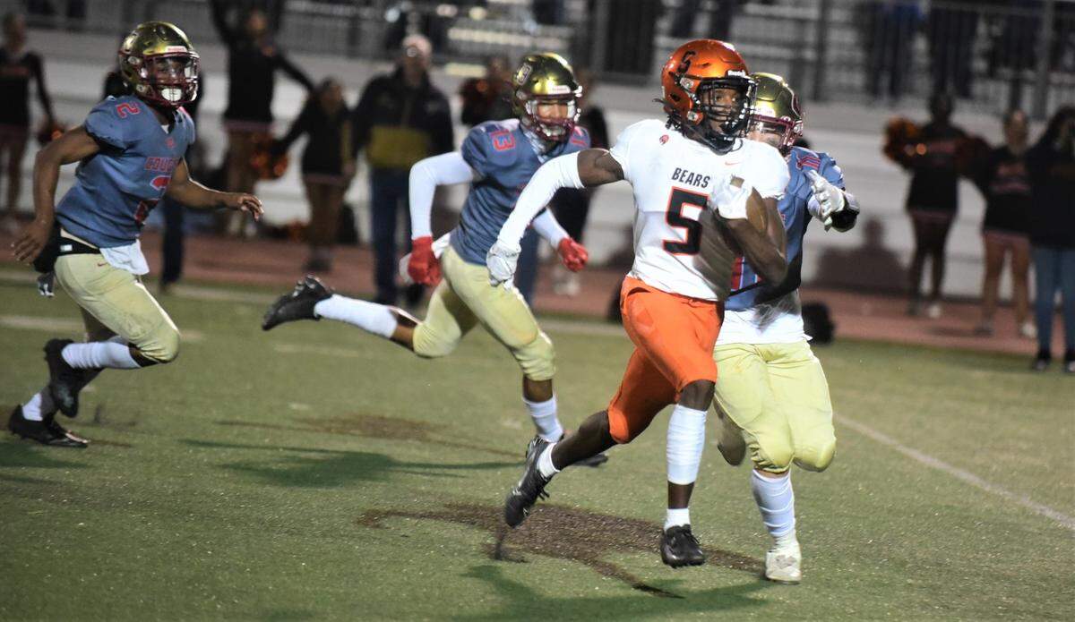 Merced High running back Chase Smith (5) rushed for 248 yards and three touchdowns to help lead the Bears to a 31-6 win over Golden Valley to extend the Merced streak to 17 consecutive wins over the Cougars on Friday, Oct. 28, 2022 at Veterans Stadium in Merced, Calif.