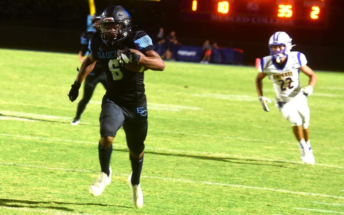 El Capitan High running back Dejuan Franklin (6) runs the ball down field during a game against Ripon Christian on Friday, Aug. 30, 2024 at Merced College.