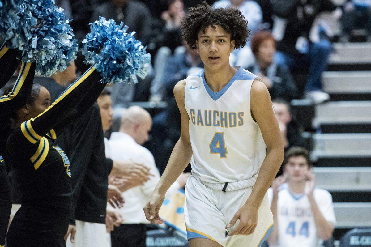 El Capitan junior Marcus McCutchen (4) take the court during a game against Golden Valley at El Capitan High School in Merced, Calif., on Wednesday, Jan. 31, 2018. The Gauchos beat the Cougars 66-56.