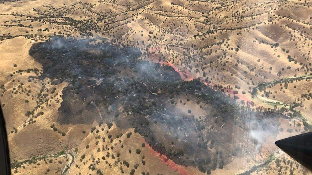 This is an overhead shot as firefighters battle the Cornetts Fire in Mariposa County that has burned 176 acres as of Saturday afternoon.