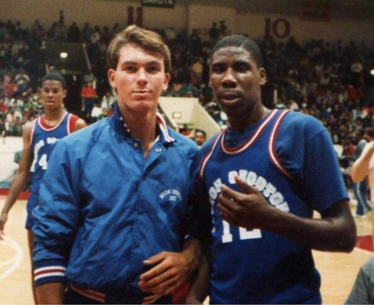 Former Merced High basketball players Chris Creswell (Carmichael), left, poses for a picture with Gerald Madkins.