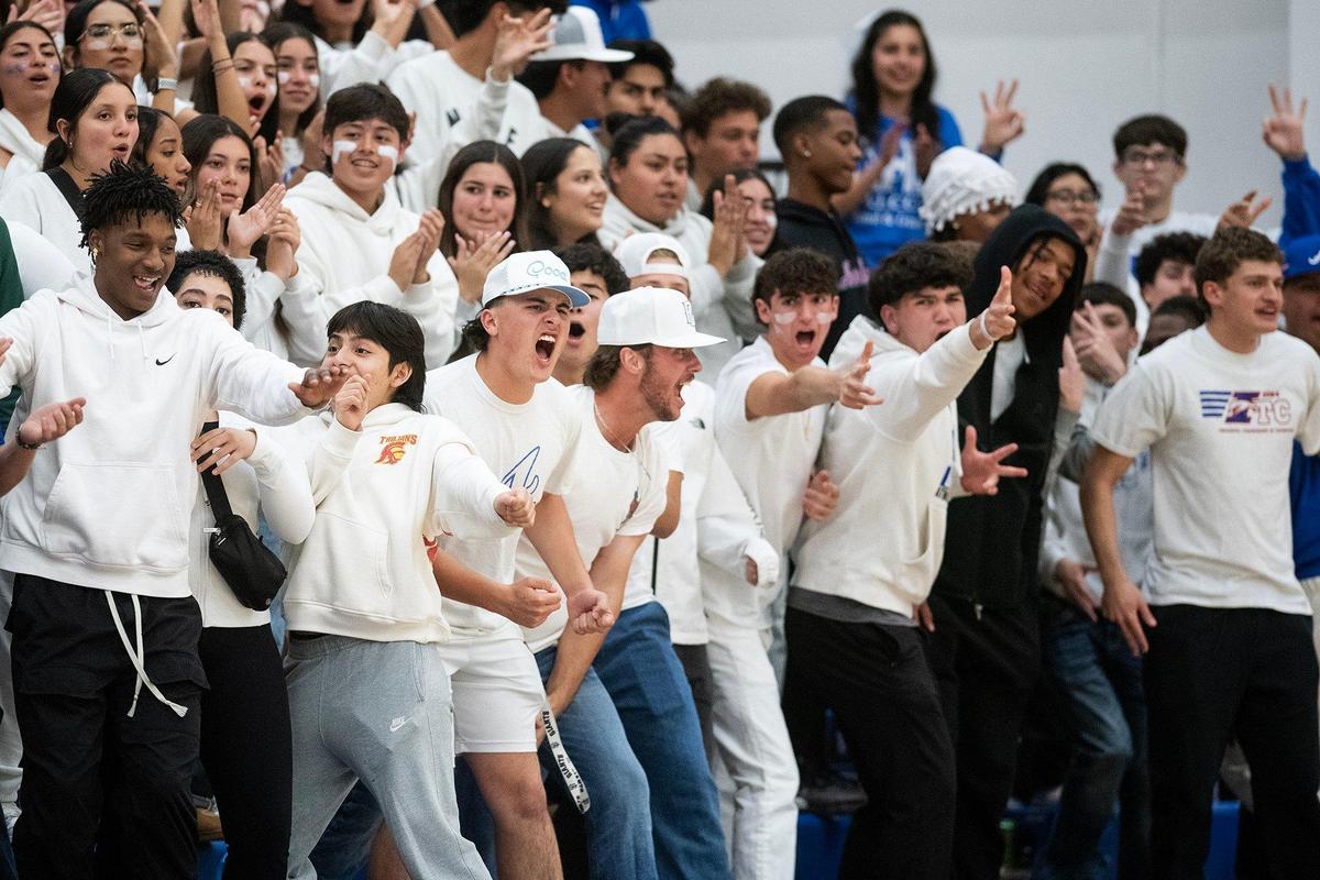 The Atwater student section celebrates a Falcons basket during a CIF NorCal Division II playoff game against Valley Christian at Atwater High School in Atwater, Calif., on Tuesday, March 4, 2025. The Falcons beat the Warriors 58-39.