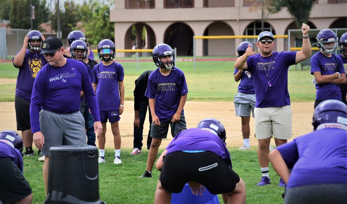 Scott Wine (left) joined the Livingston High coaching staff that already had his two sons, Steven (right) and Brian (not pictured).