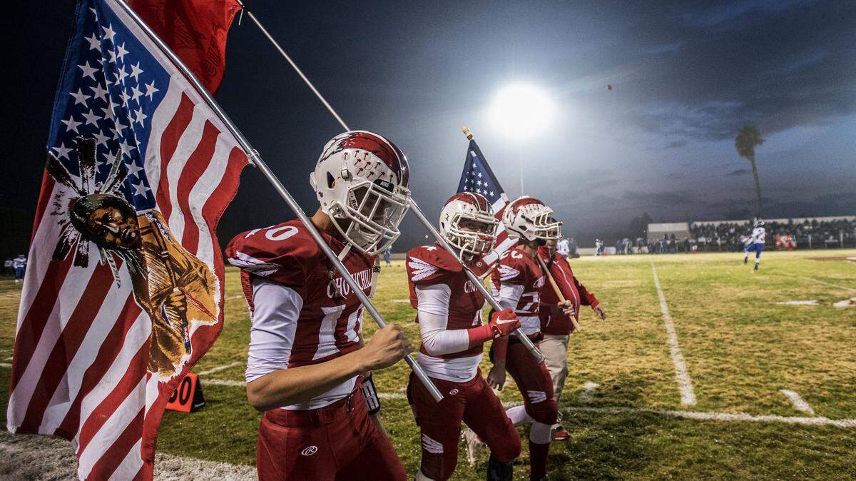 The Chowchilla Redskins take the fired prior to the Division IV-A State Bowl Championship game against Sierra at Chowchilla High School in Chowchilla, Calif., Saturday, Dec. 19, 2015. The Timberwolves beat the Redskins 20-15.