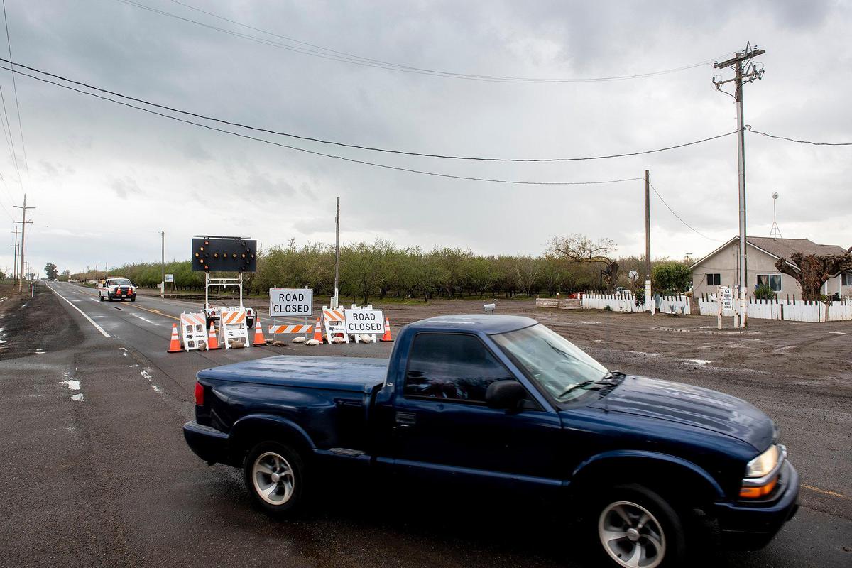A section of Highway 59 is closed between Reilly Road and McNamara Road due to flooding in Merced County, Calif., on Sunday, March 12, 2023.