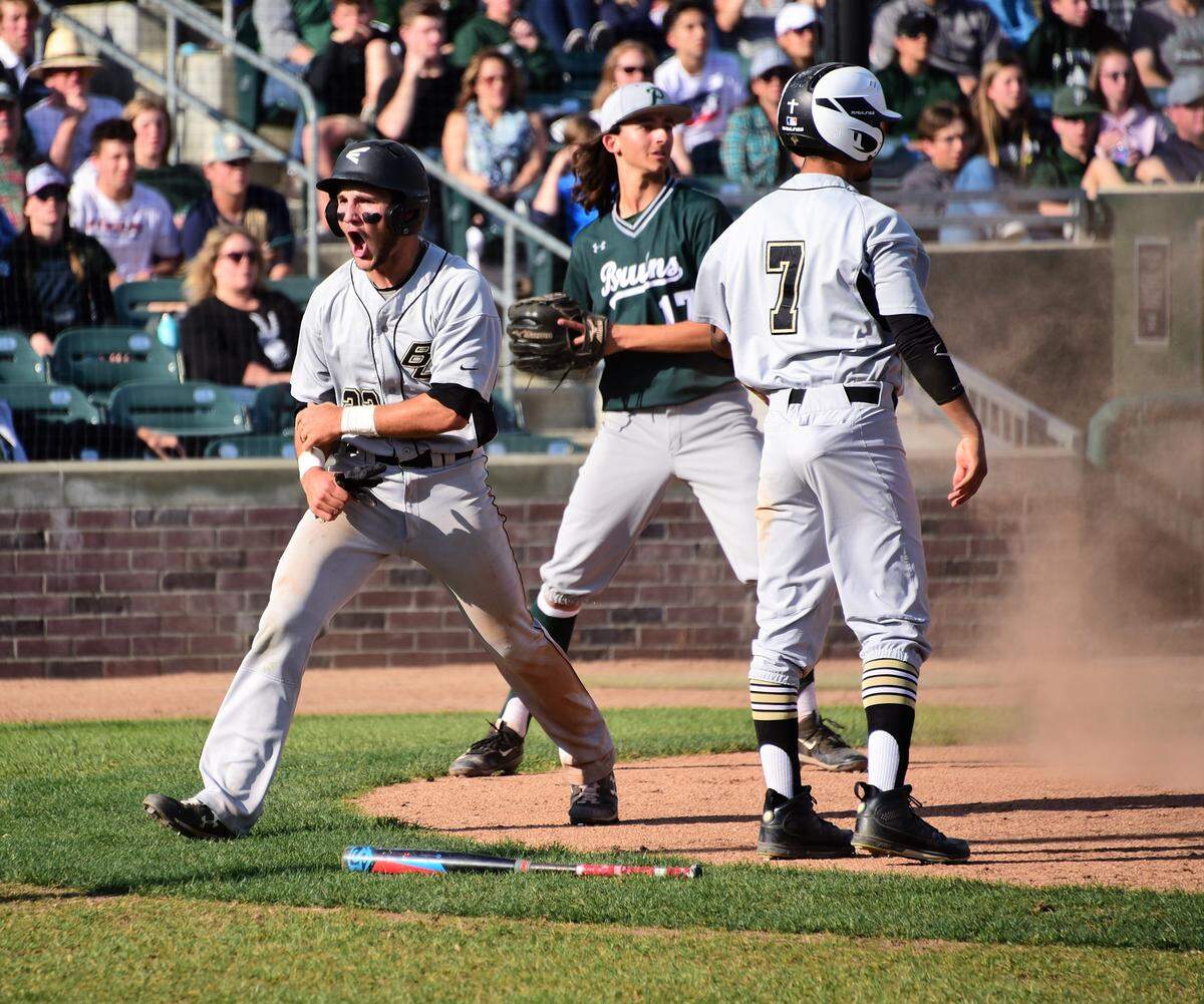 Buhach Colony senior Brendan Ekizian celebrates after scoring a run during the Sac-Joaquin Section Division III championship game against Ponderosa on Monday, May 27, 2019.