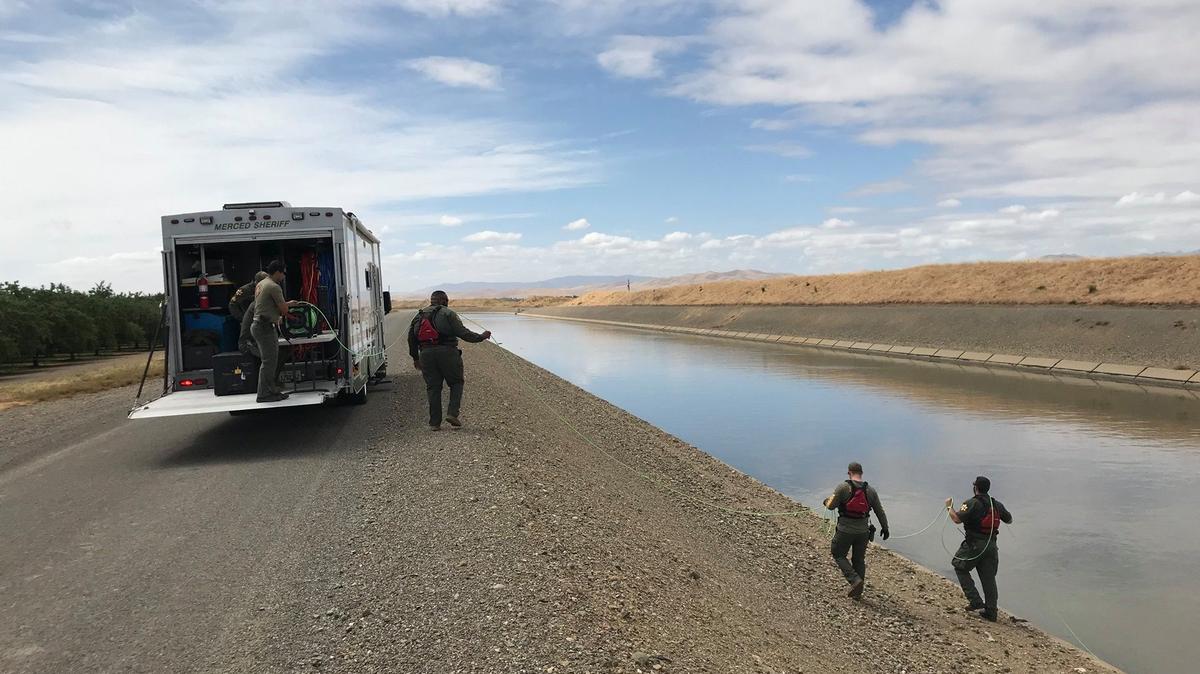 Merced County Sheriff’s Office deputies search the Delta-Mendota Canal in 2019. A woman’s body was pulled from the canal in February.