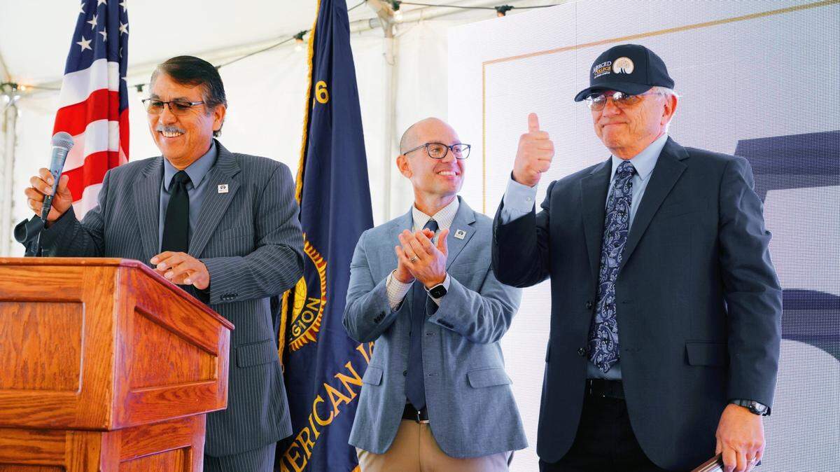 Merced College Board of Trustees member Joe Gutierrez (left) and Merced College President Chris Vitelli (center) help recognize former Los Banos Campus Dean John Spevak with a Legacy of Leadership Award during the Merced College Los Banos Campus 50th Anniversary celebration on Friday Nov. 5, 2021.