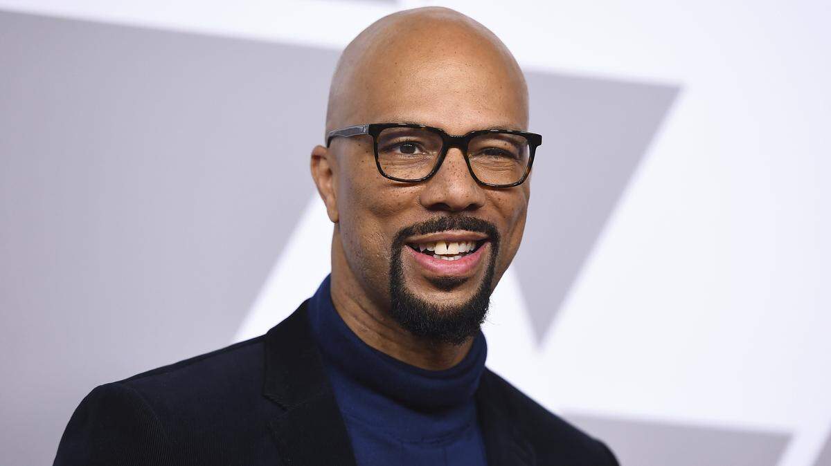 FILE - In this Feb. 5, 2018 file photo, Common arrives at the 90th Academy Awards Nominees Luncheon in Beverly Hills, Calif. Common showed up at P.S. 111 in midtown Manhattan on Thursday as an ambassador for the Adopt-A-Classroom initiative. He made the surprise appearance with his mother, Dr. Mahalia Hines, to present the school with a $10,000 check. (Photo by Jordan Strauss/Invision/AP, File)