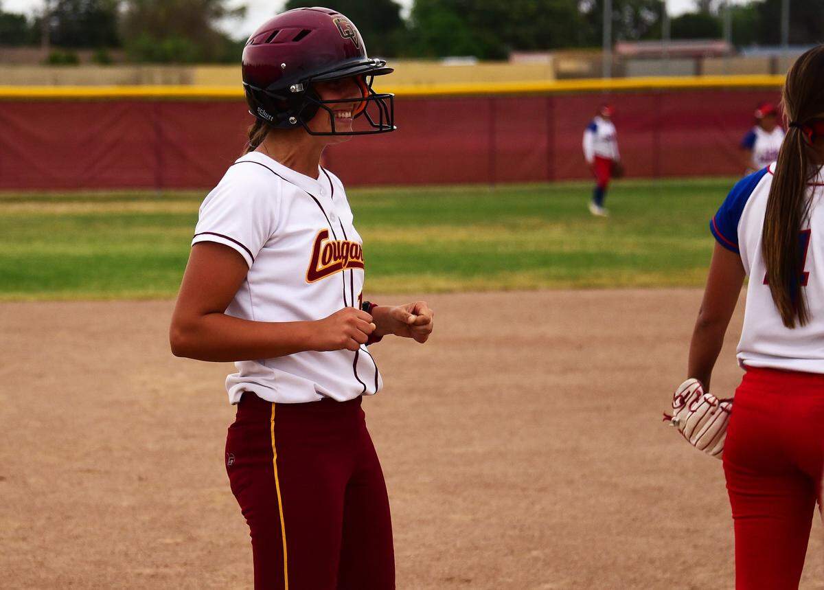 Golden Valley sophomore Maddy Stokes celebrates after hitting a three-run triple during the fifth inning as the Cougars defeated East Union 7-0 on Wednesday in the Sac-Joaquin Section Division III playoffs at Golden Valley High.
