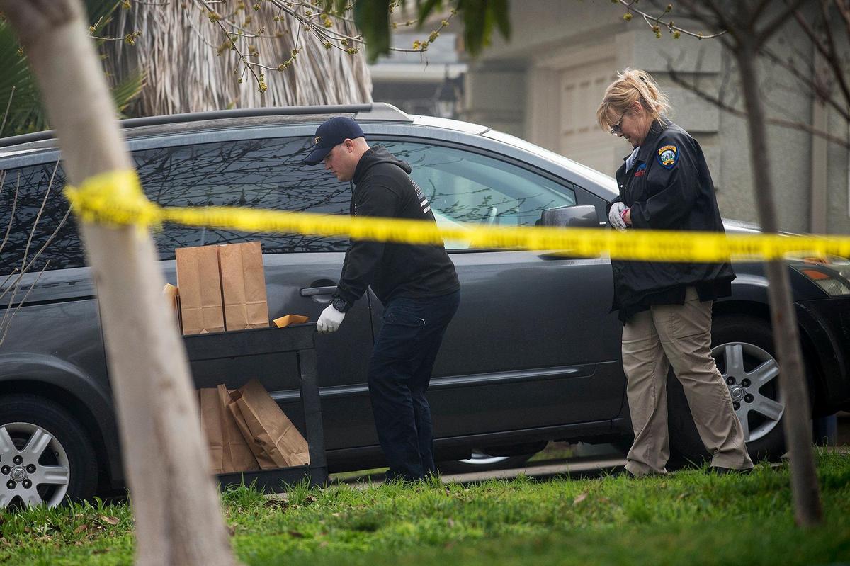 The Merced Police Department investigates the scene of a homicide and home invasion in the 400 block of Tucolay Court in Merced, Calif., on Friday, Jan. 25, 2019. According to Lt. Jay Struble, a 34-year-old man died of injuries consistent with a gunshot wound, after multiple people entered the home early Friday morning. Police said the suspects stole items from the residence before fleeing the area.