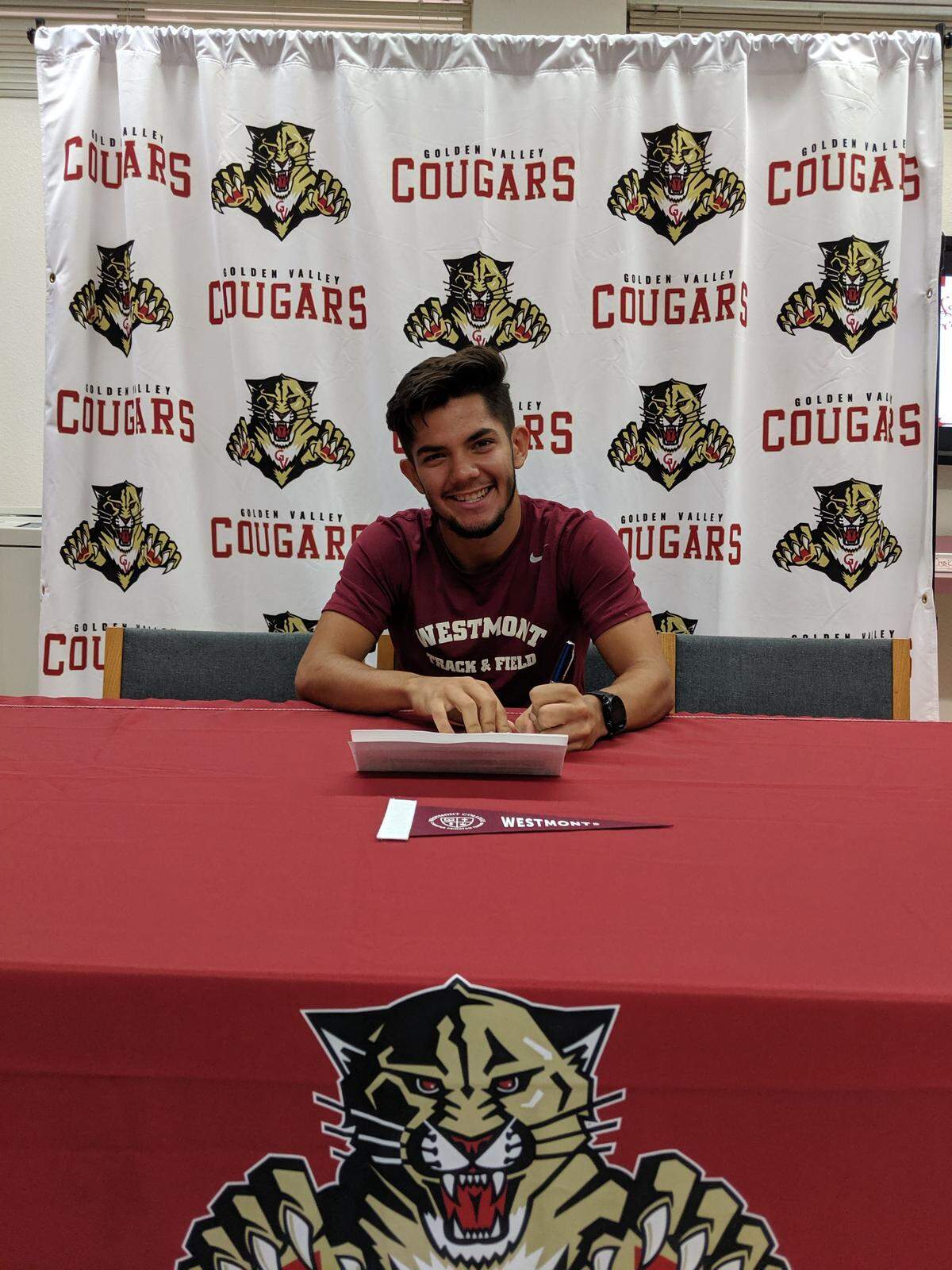 Golden Valley senior Damien Ureste signs his national letter of intent with Westmont College in Santa Barbara.