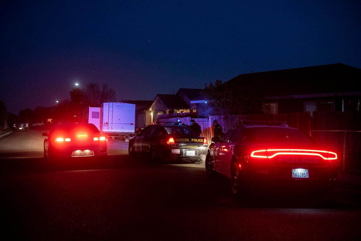 Merced Police Department detectives investigate the scene of a shooting that injured a 27-year-old man in the 1500 block of La Mirada Drive in Merced, Calif., on Monday, Jan. 31, 2022.