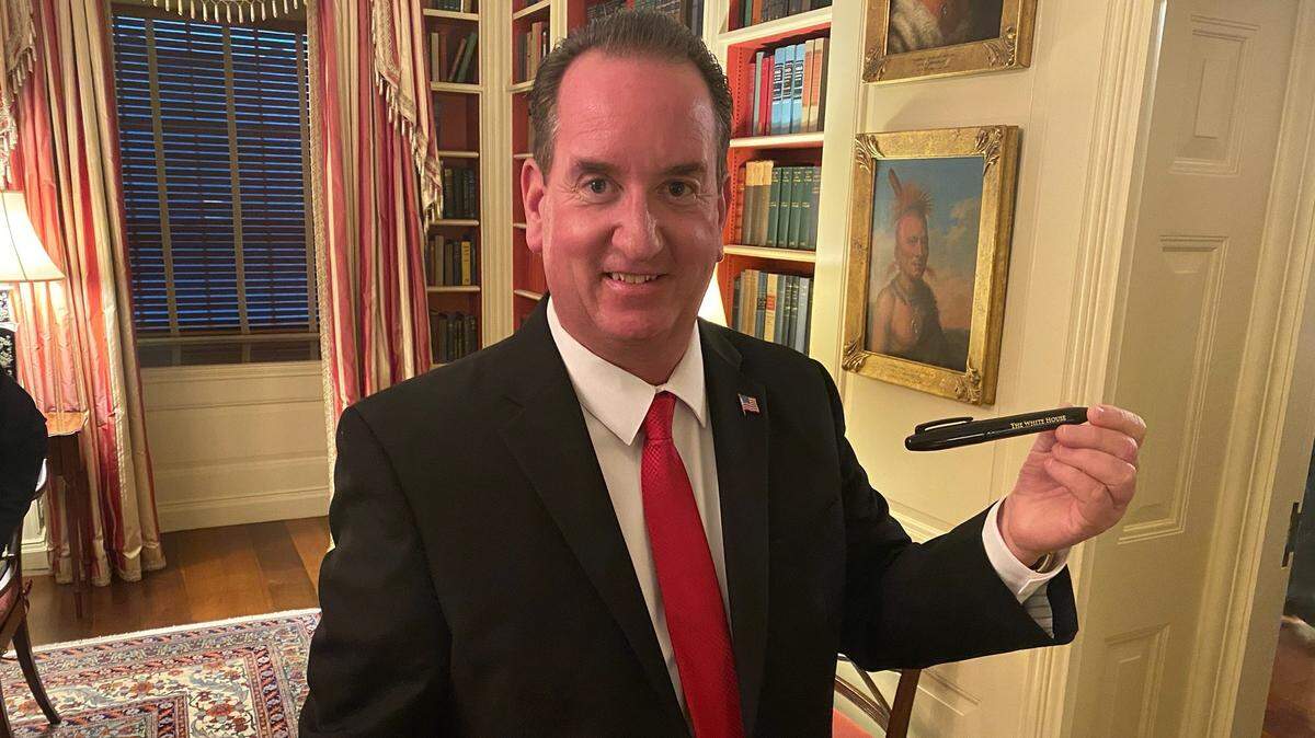 Atwater Mayor Paul Creighton displays a pen given to him by President Donald Trump after the President signed a bill on Thursday, Jan. 24, 2020 at the White House in Washington D.C.