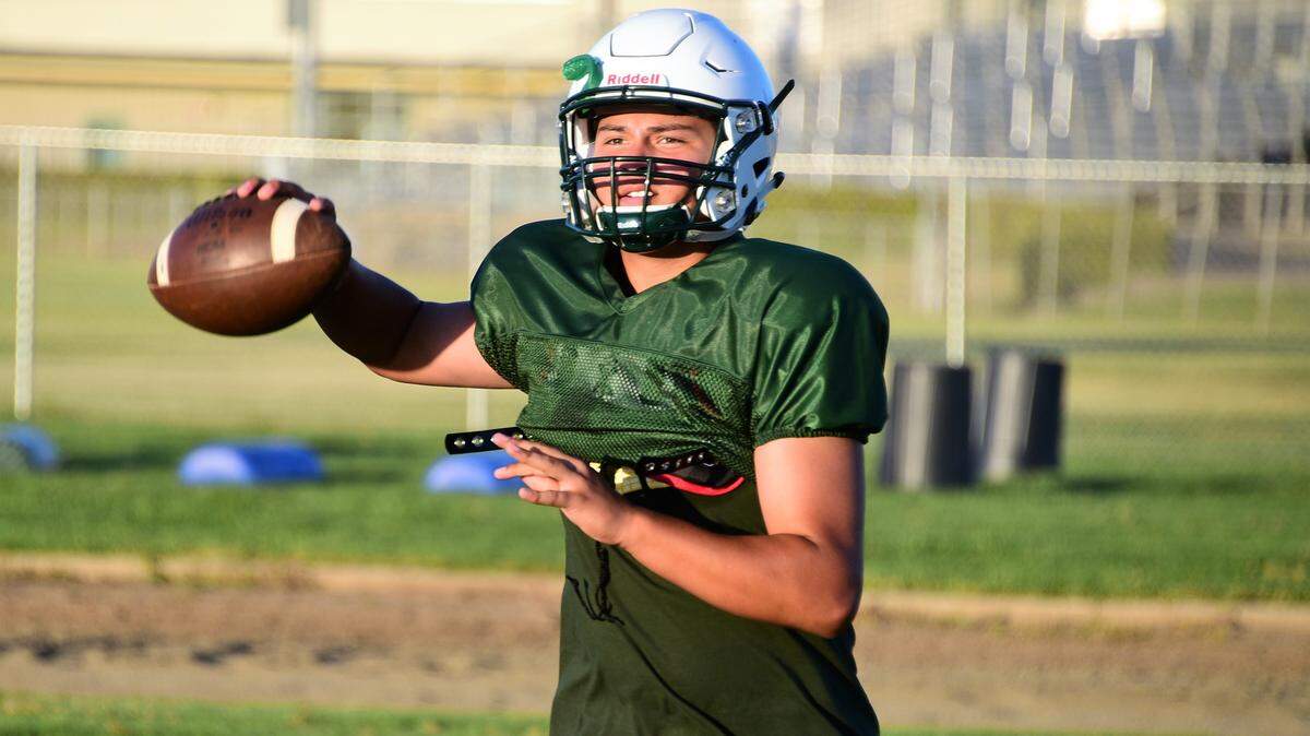 Sophomore Aaron Martinez was a ball boy growing up for the Le Grand High football team. He’ll be the starting quarterback as a sophomore for the Bulldogs this season.
