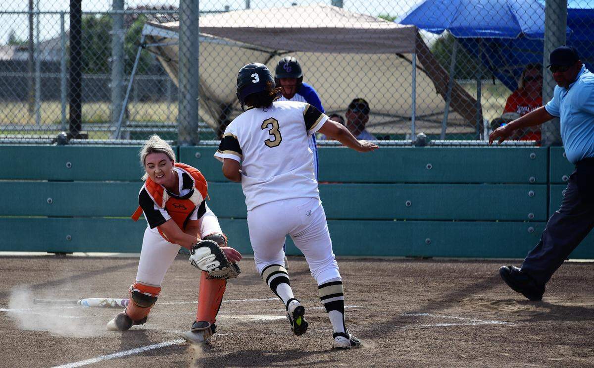 Buhach Coloy junior Jenny Aguilar beats the tag by the West Sierra League catcher during the fifth annual Paul Leonardo Memorial All-Star Game on Tuesday, June 11, 2019 at the Livingston Softball Complex.