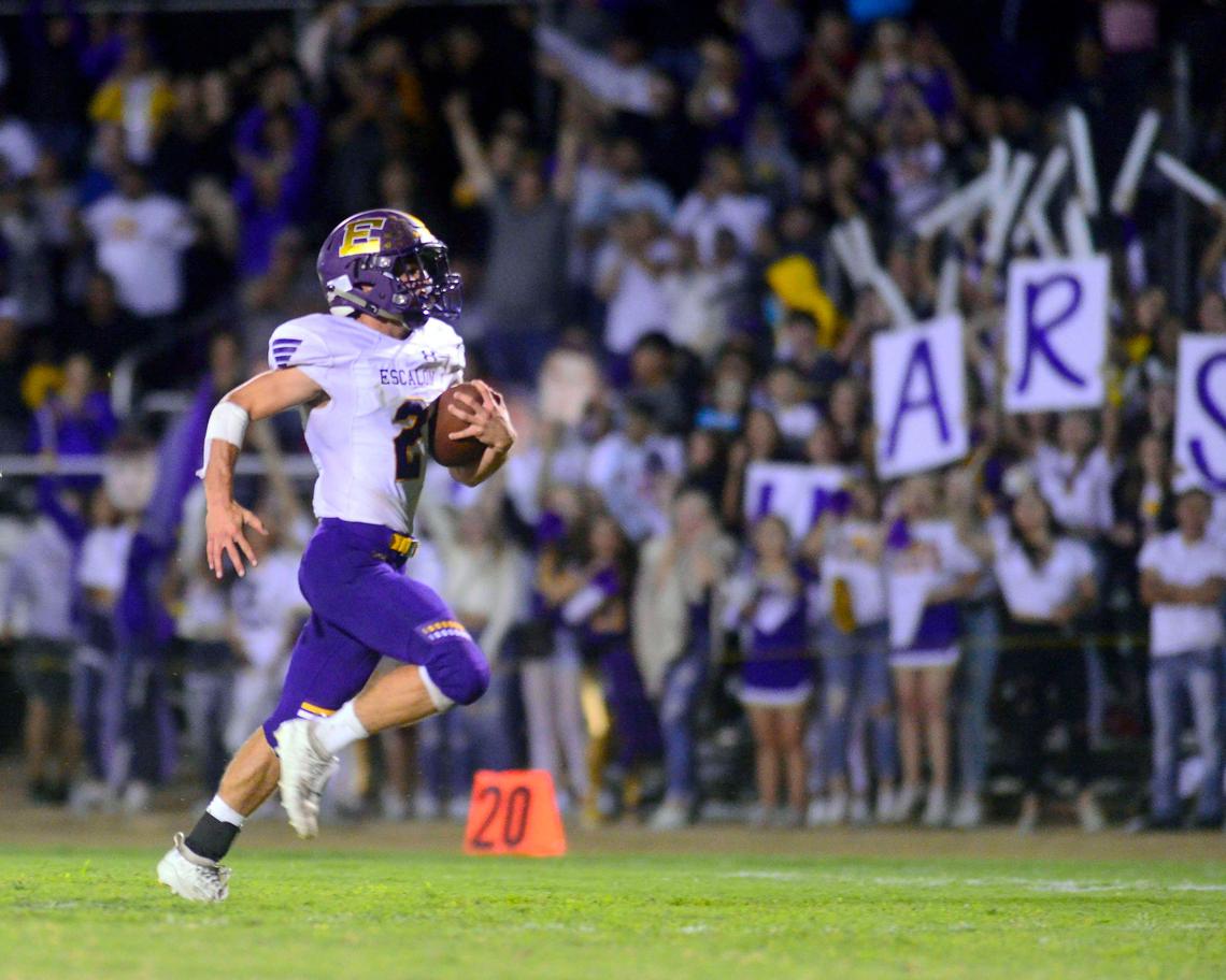 Escalon running back Colton Panero (2) breaks free to score a touchdown during a game between Hilmar High School and Escalon High School at Hilmar High School in Hilmar California on September 20, 2019.