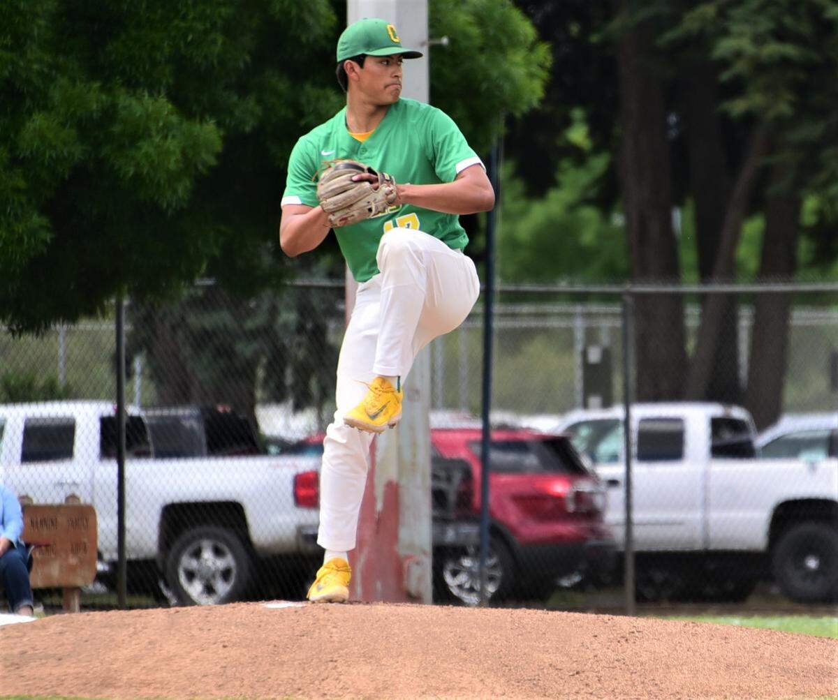Canada College pitcher Danny Guevara Castro delivers a pitch against Merced College during a playoff game on Saturday, May 6, 2023.