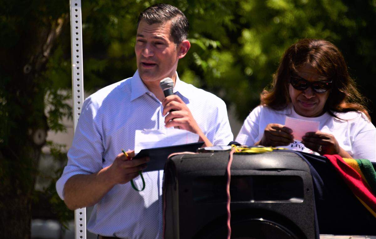 Merced Mayor Matthew Serratto addresses the crowd prior to the Juneteenth parade in Merced, Calif., on Saturday, June 17, 2023.