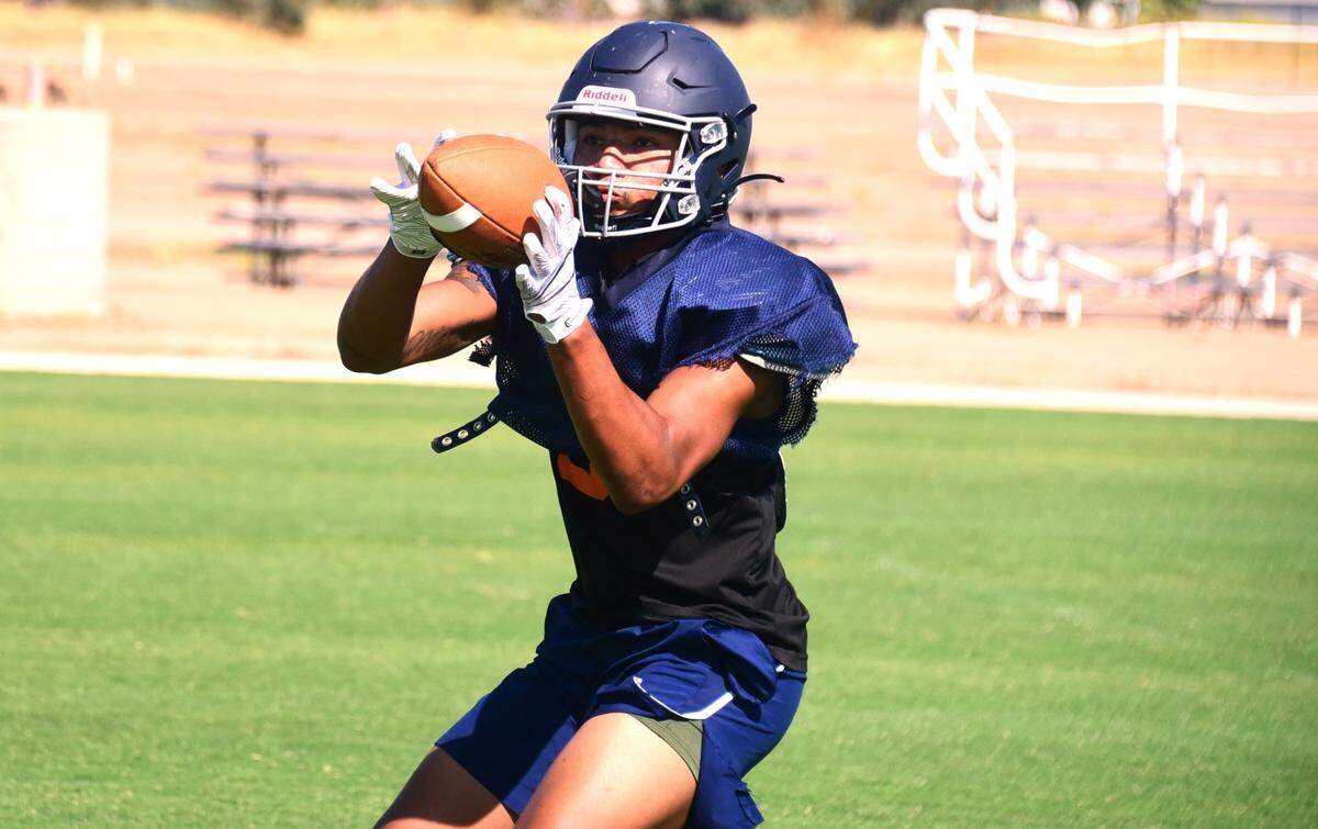 Stone Ridge Christian junior Daijon O’Neil catches a pass during practice on Wednesday, Aug. 7, 2024.