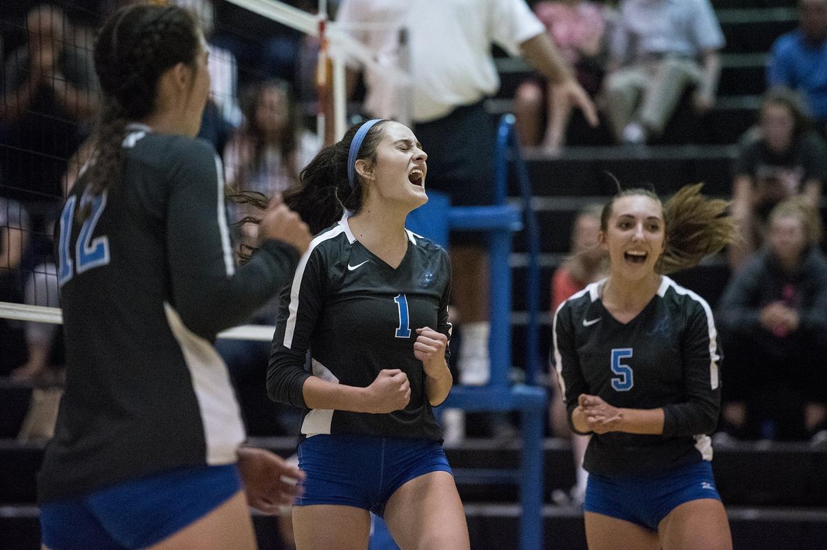 Atwater senior Lexi Valencia (1) screams as she celebrates a Falcons point with teammates during a match against El Capitan at El Capitan High School in Merced, Calif., on Wednesday, Aug. 29, 2018. The Gauchos beat the Falcons 3-0.