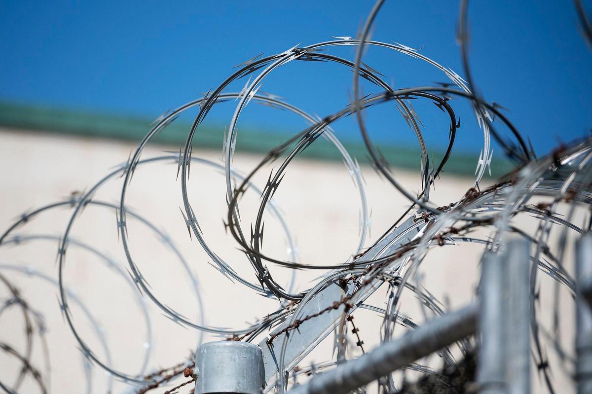 Fencing and razor wire surround a facility at the John Latorraca Correctional Center located off of Sandy Mush Road in Merced County, Calif., on Tuesday, Sept. 19, 2023. Law enforcement and elected officials held a groundbreaking ceremony Tuesday for a two-phase construction project to upgrade the John Latorraca Correctional Center.