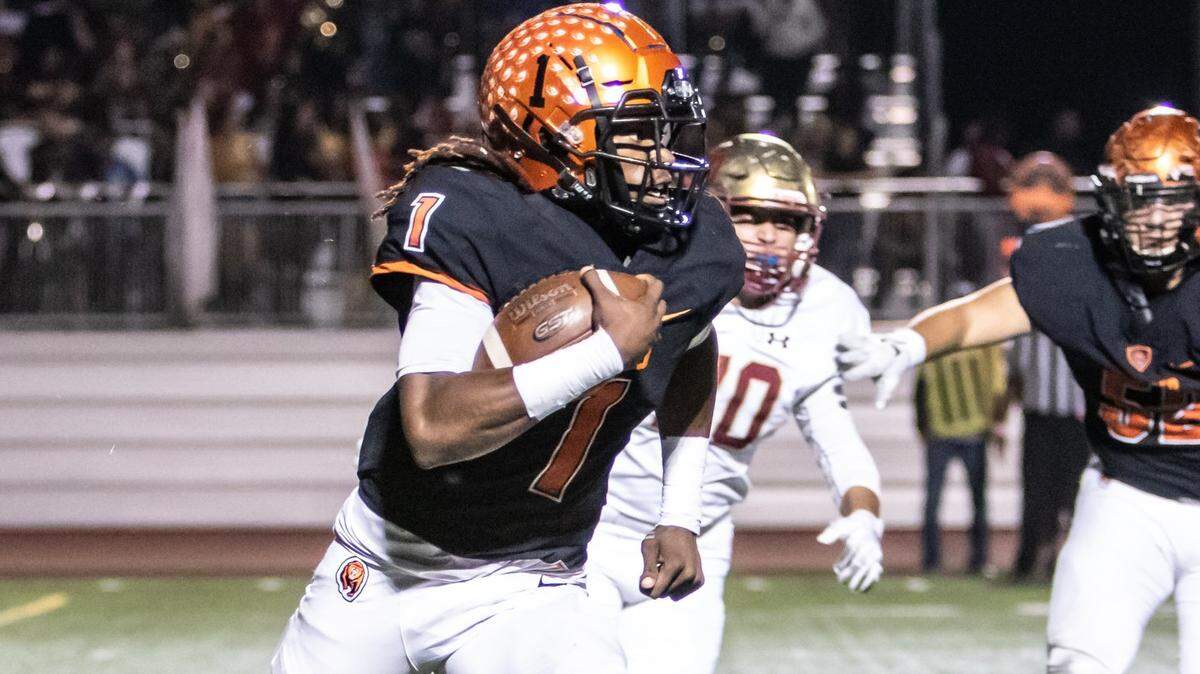Merced quarterback Dhameer Warren runs the ball during the Bears’ 41-7 win in the 25th annual Battle for the Mayor’s Cup against Golden Valley on Friday, Oct. 26, 2018 at Veterans Stadium in Merced, Calif. Warren was selected by the Central California Conference coaches as the conference’s Most Valuable Player.